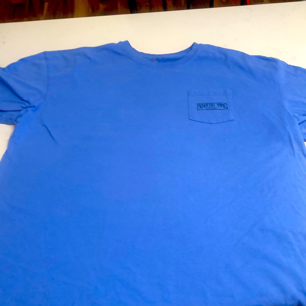 Knotted pine T-shirt. No rips or stains.
